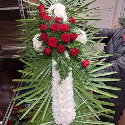 Cross edged with palm leaves